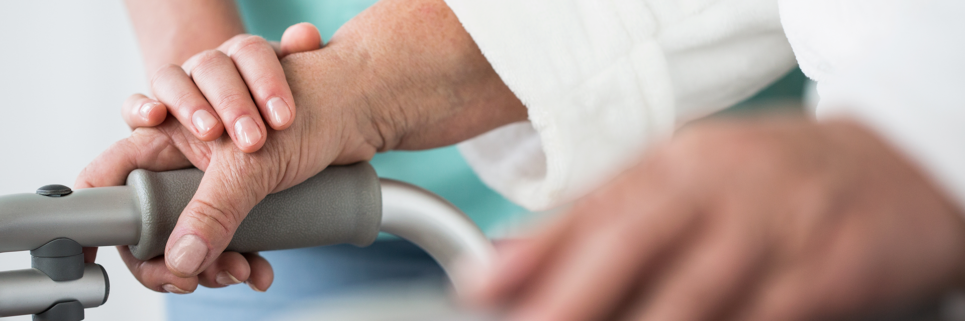 Doctors and Nurses hands stacked on top of each in support